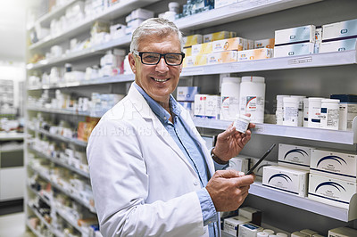 Buy stock photo Pharmacy, medicine and tablet with portrait of man at shelf in store for stock, inspection and inventory. Medical, healthcare and pills with senior pharmacist for technology, wellness and product