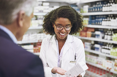 Buy stock photo Old man, medicine advice or pharmacist speaking in pharmacy for retail healthcare info, pills or advice. Black woman or doctor helping a mature customer with prescription medication or medical drugs 