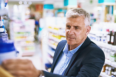 Buy stock photo Senior man, pharmacy or customer searching for retail healthcare pills, medicine in drugstore. Looking, businessman or mature customer checking or choosing medication or medical vitamins on shelf
