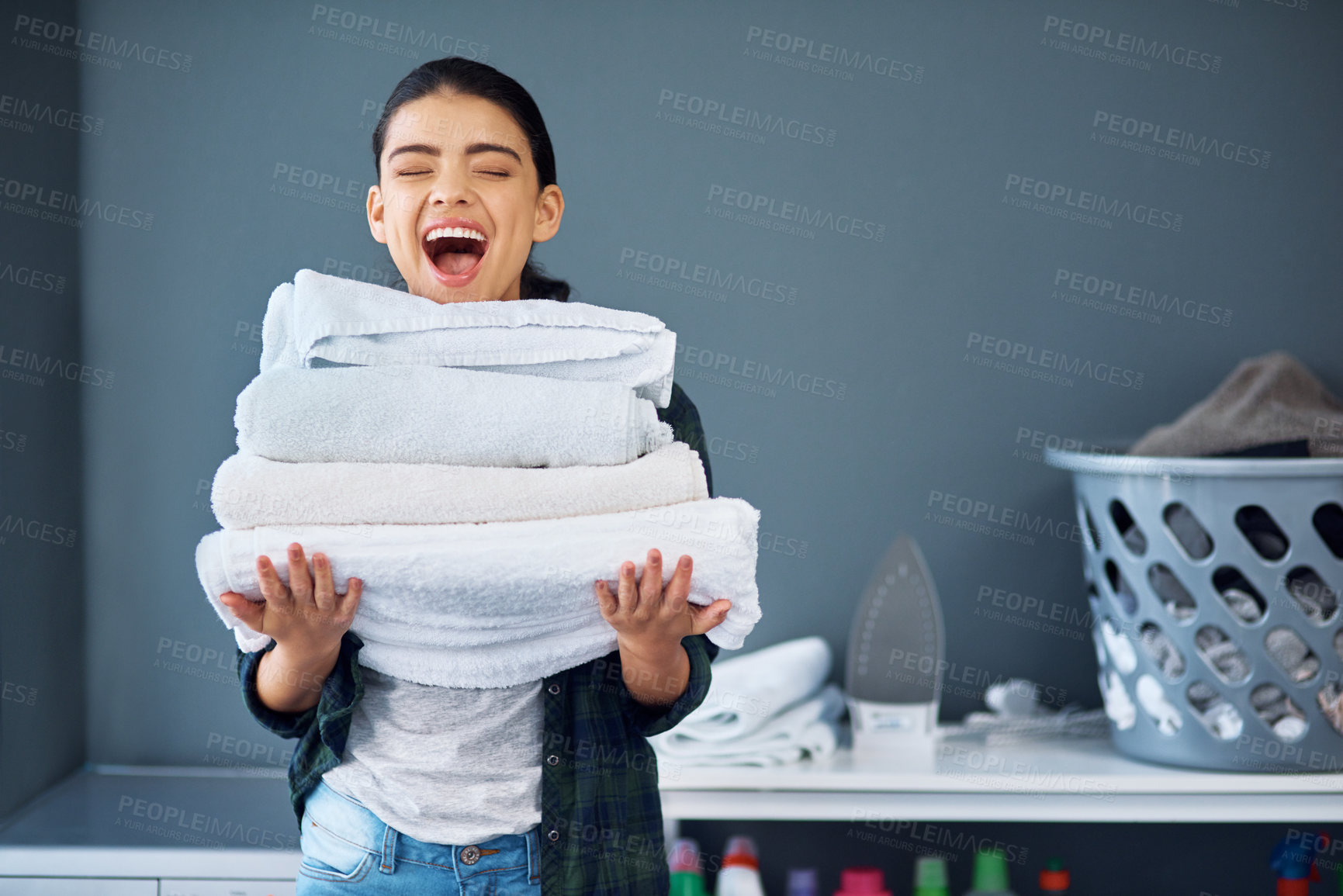 Buy stock photo Laundry, folded and woman with towel, excited and spring cleaning in weekend, linen or routine in house. Housework, washing and person with chores, enthusiasm and pile in home, wow or joy for hygiene