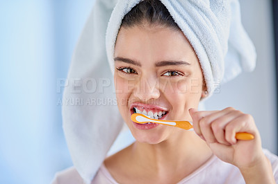 Buy stock photo Woman, towel and portrait with toothbrush in bathroom for oral care, gum health and morning routine. Home, smile and female person with brushing teeth dental hygiene, cleaning and cavity prevention