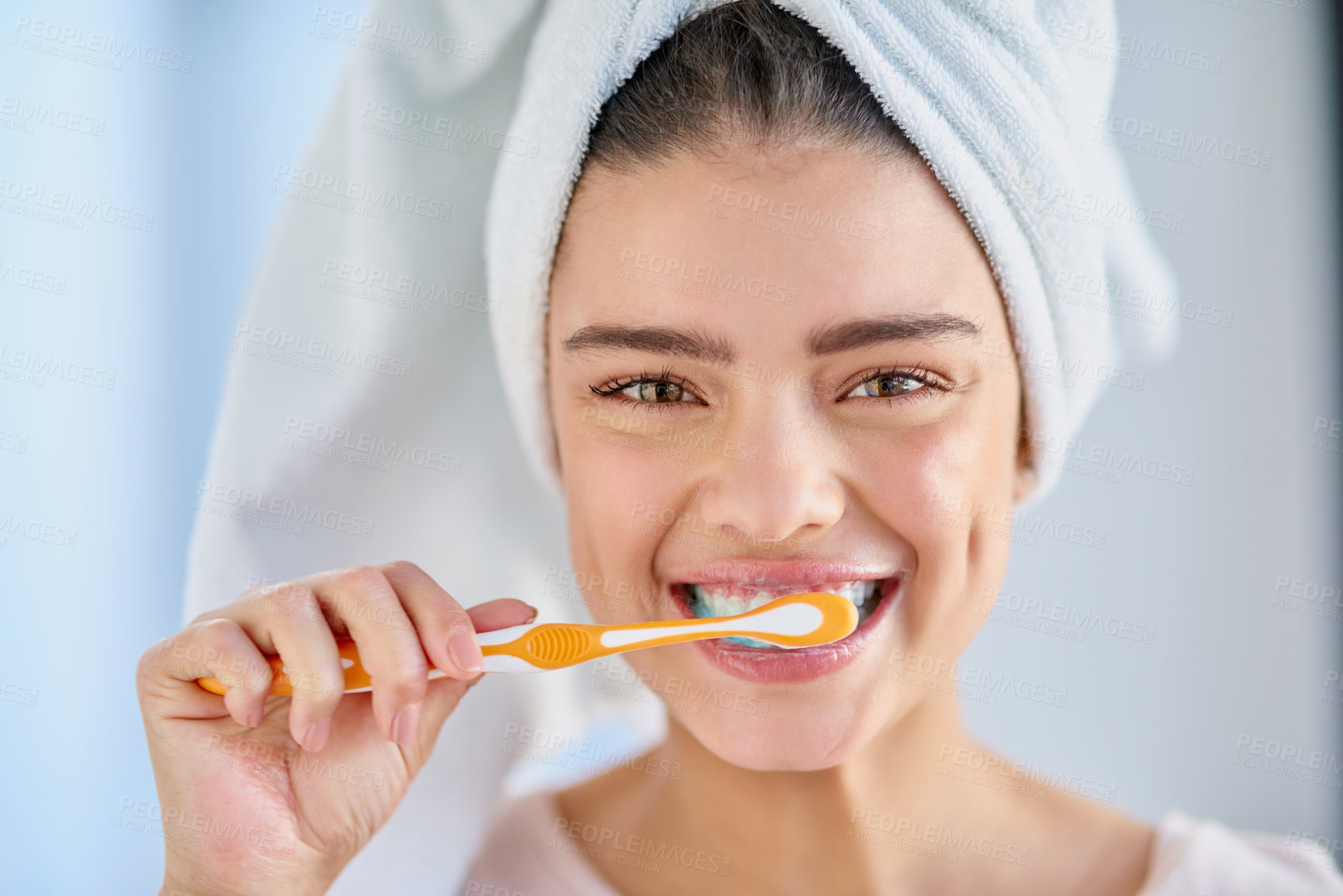 Buy stock photo Happy, woman and portrait with brushing teeth in home for oral hygiene, health and fresh breath. Towel, smile and female person with toothbrush for dental care, cleaning or plaque removal in bathroom