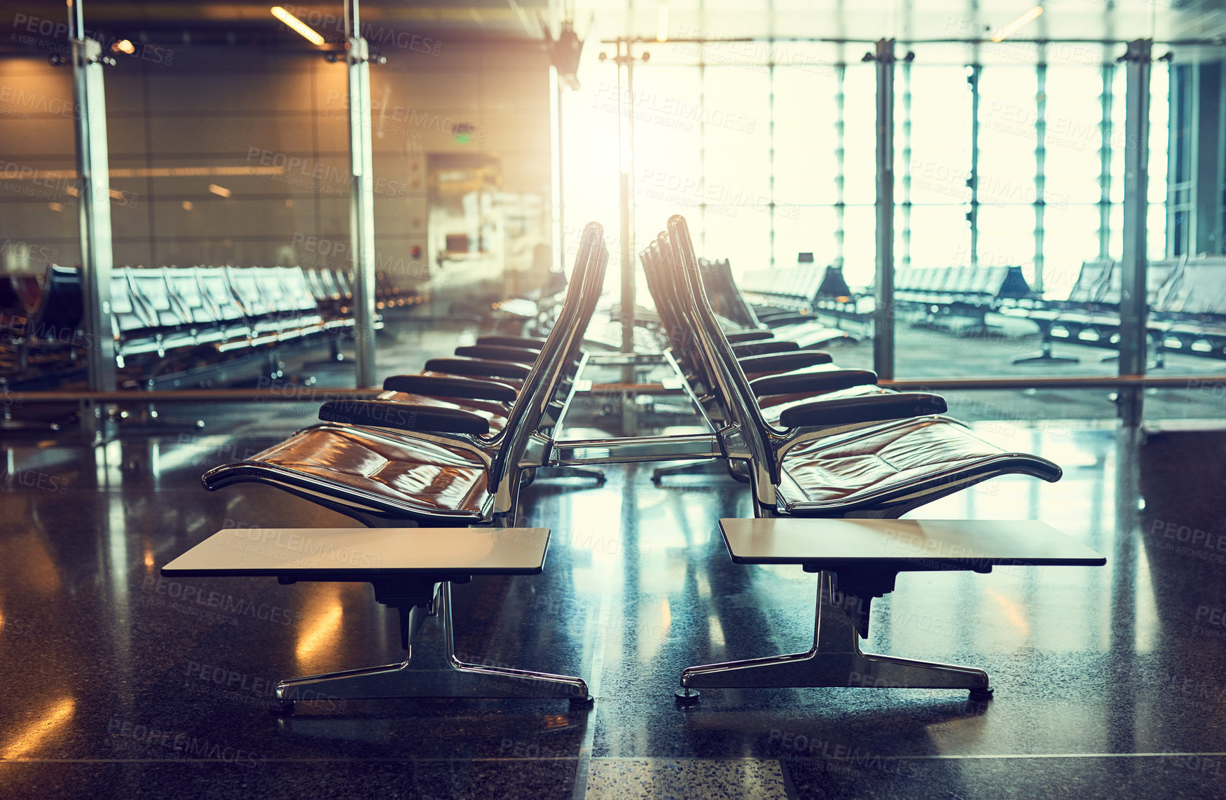 Buy stock photo Empty, waiting room and seat in airport, row and lounge for departure, travel and building for passengers. Chair, terminal and lobby for check in, flight and window of glass, bench and tourism