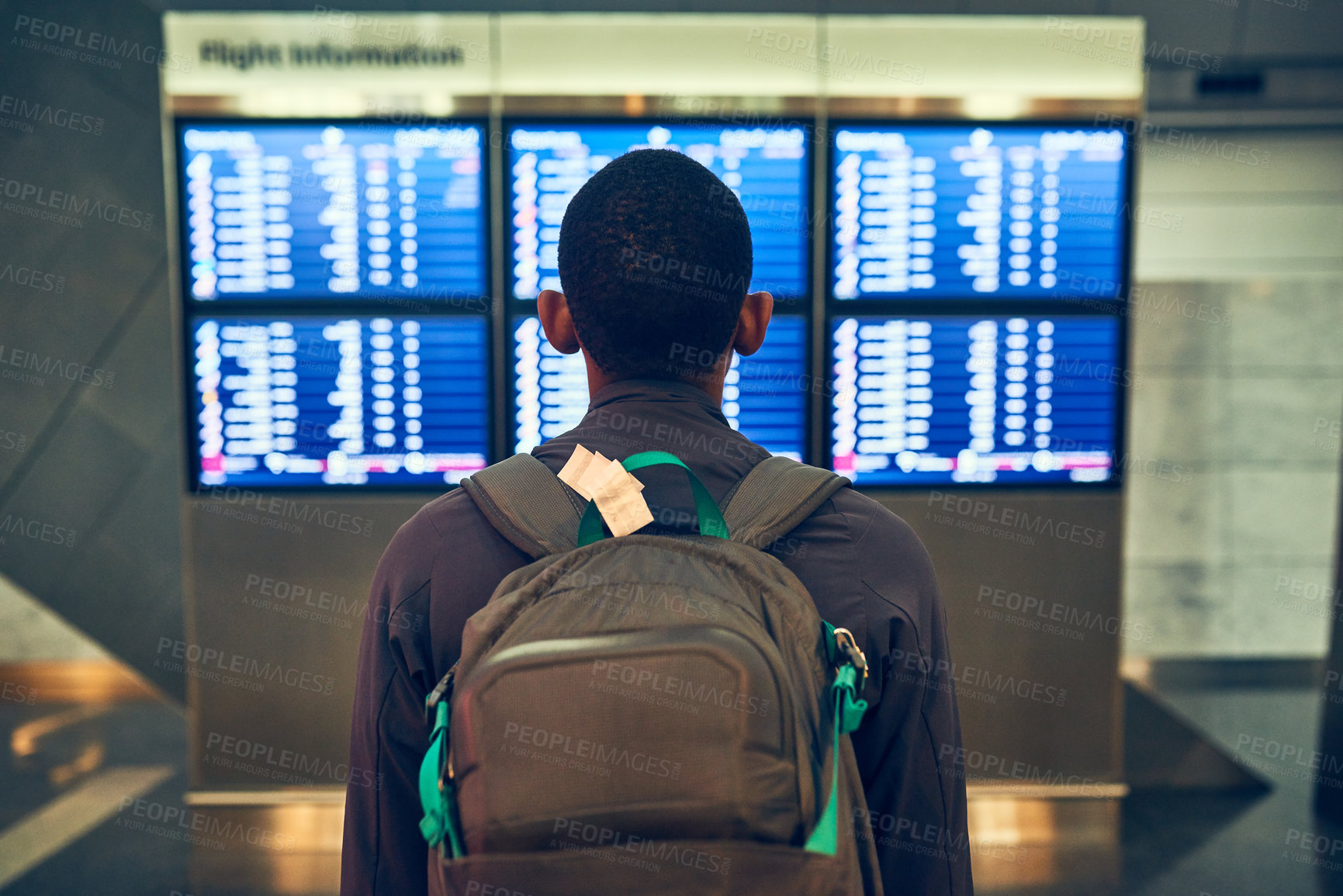 Buy stock photo Man, back and check of timetable for flight, backpack and delay of airplane in airport and waiting room. Travel, runaway and luggage for fresh start in California, immigration or thinking of decision