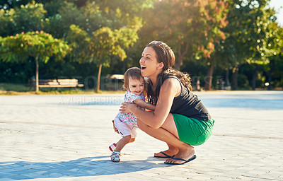 Buy stock photo Shot of a young mother and her little girl outdoors