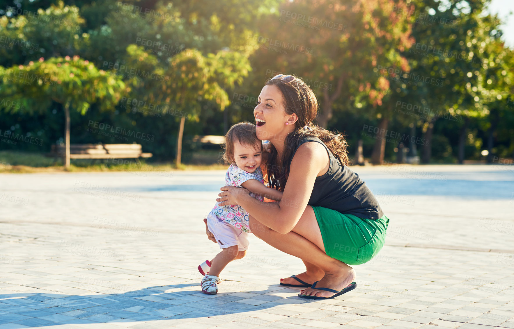 Buy stock photo Shot of a young mother and her little girl outdoors