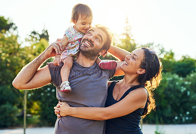 Buy stock photo Shot of a young family outdoors