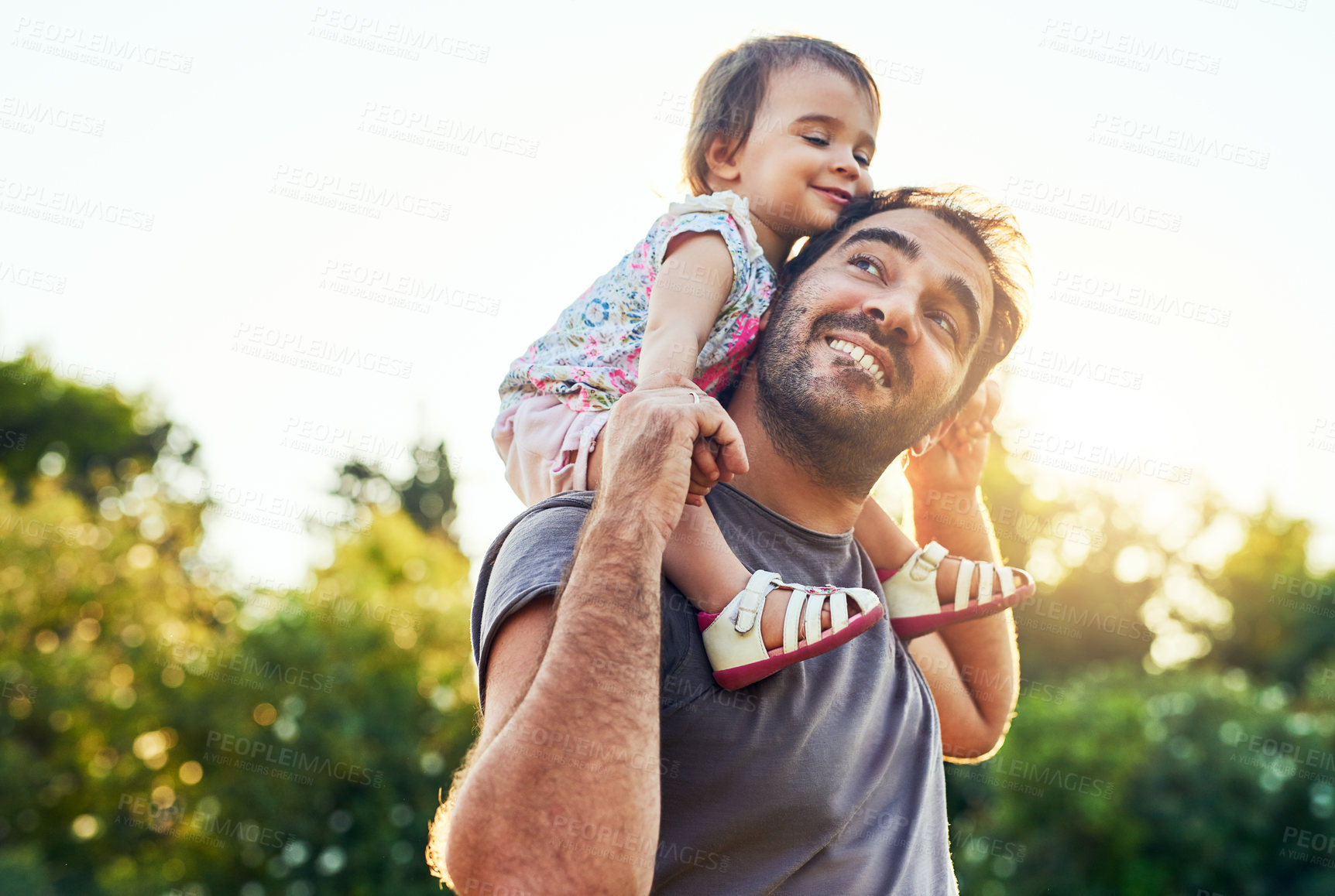 Buy stock photo Dad, daughter and smile on shoulders in park with trust, happiness or love in summer sunshine. Young family, baby girl or walk together for freedom, bond and piggyback with care, backyard or garden