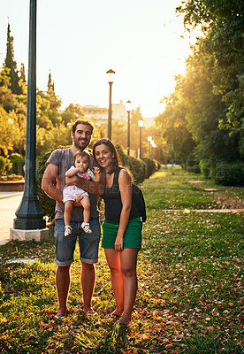 Buy stock photo Shot of a young family outdoors