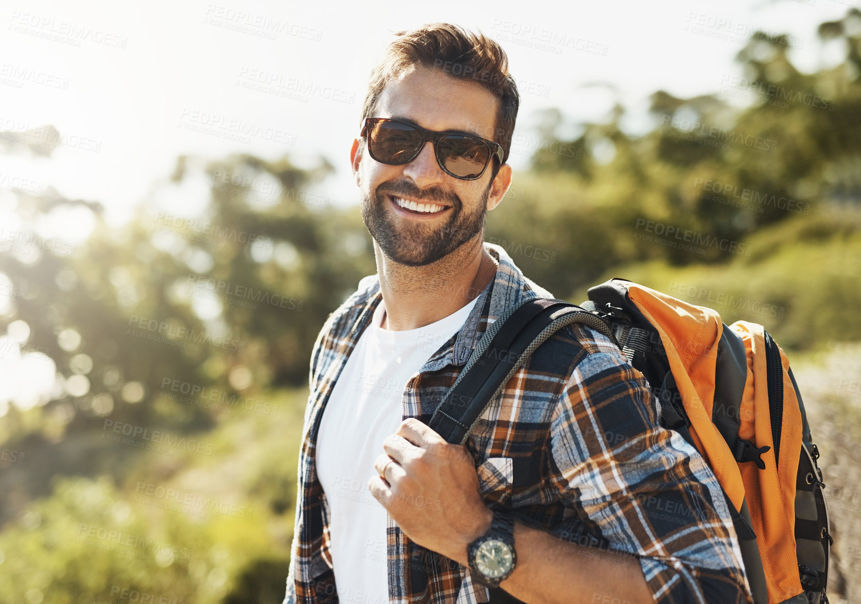 Buy stock photo Happy, nature and man hiking on vacation for adventure, travel or journey with backpack in New Zealand. Smile, sunglasses and male person trekking on outdoor trail or path on holiday or weekend trip.