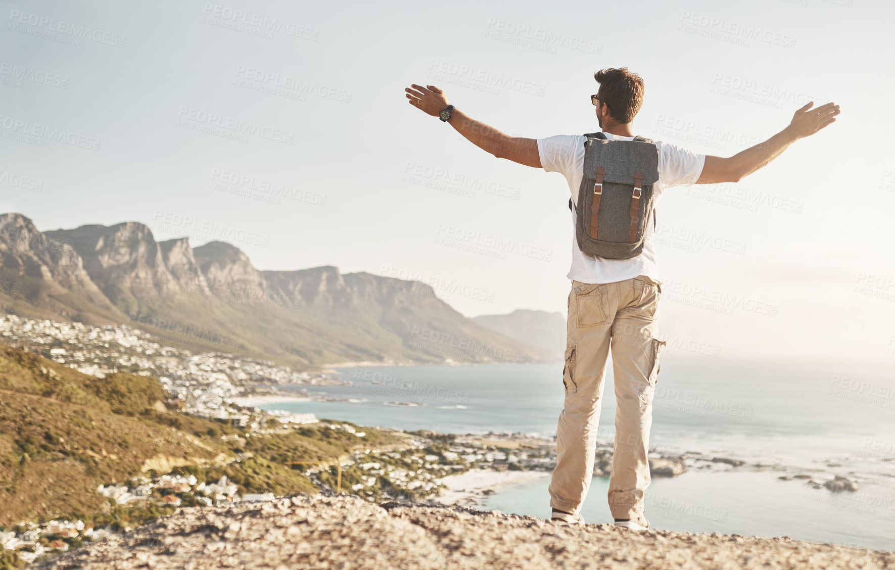 Buy stock photo Back, travel and man with success for hiking, outdoor fitness and goal for destination by scenery. Hiker, male person and freedom with hands up for achievement, trail celebration or adventure victory