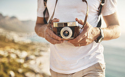 Buy stock photo Travel, hands and person with camera for picture, document experience and photography of nature. Space, man photographer and explore with vintage equipment on vacation, holiday and capture memory