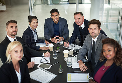 Buy stock photo Shot of businesspeople having a meeting in the office