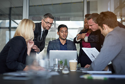 Buy stock photo Shot of businesspeople having a meeting in the office