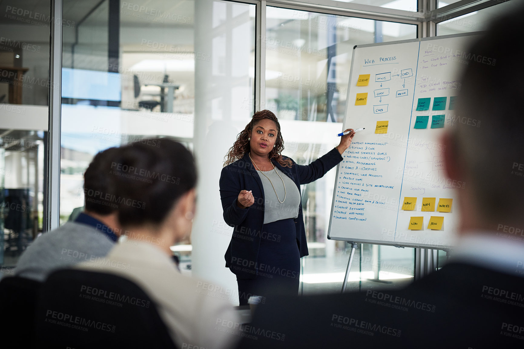 Buy stock photo Shot of businesspeople having a meeting in the office