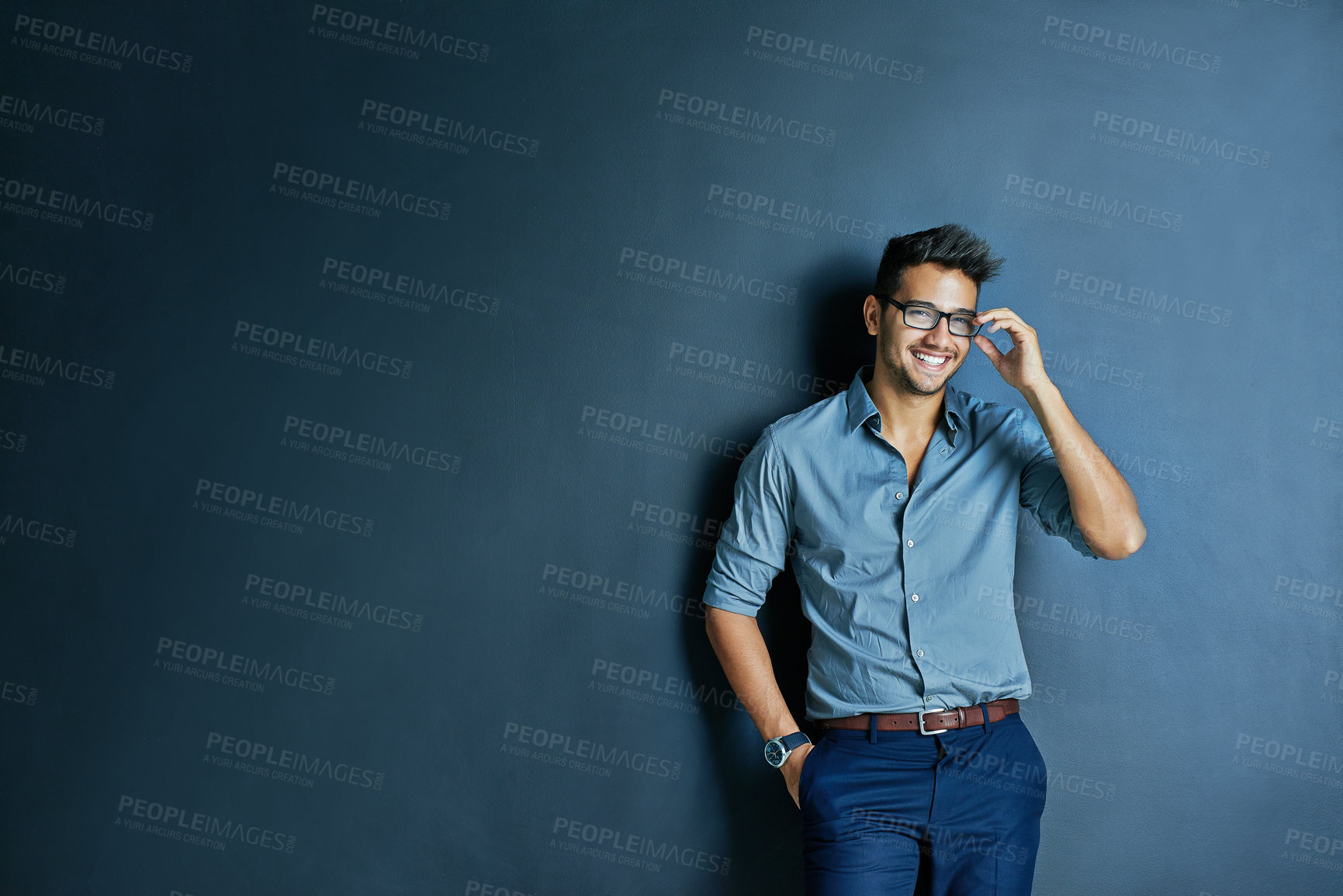 Buy stock photo Happy business man, wall background and space with smile, portrait and fashion for entrepreneur in mockup. Excited businessman, holding glasses or smile for career, vision or entrepreneurship mock up