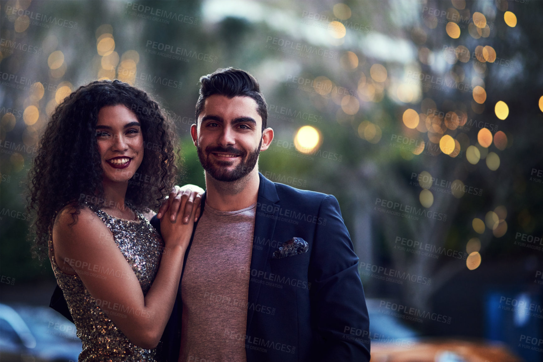 Buy stock photo Portrait, love and date with a couple on a night out in the city together for romance or celebration. Elegant, nightlife or dating with a young man and woman standing outside for bonding or affection