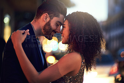 Buy stock photo Hug, smile and interracial couple in the city for a date, anniversary or valentines day in France. Love, romance and man and woman embracing for affection, care and gratitude on a honeymoon at night