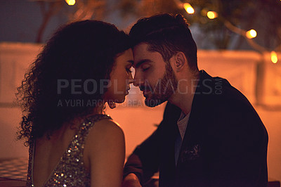 Buy stock photo Love, passion and interracial couple on a date at a restaurant for nightlife, valentines day and city bonding. Care, embrace and man and woman with gratitude, calm and romance in Italy at night
