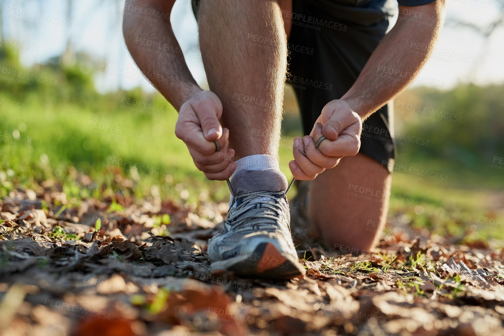 Buy stock photo Hike, person or athlete tying lace ready for forest run, jog or summer adventure for health and fitness. Peaceful, outdoor and sports shoes on for performance, morning cardio and exploring nature