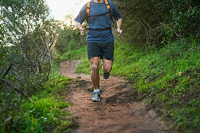 Buy stock photo Hike, man or athlete running in forest for workout, jog or summer adventure for health and fitness. Male person, outdoor and active with backpack for performance, morning cardio and exploring nature