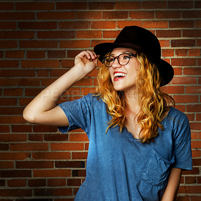 Buy stock photo Woman, smile and confident fashion by brick wall, pride and glasses or accessories for outfit. Female person, streetwear and gen z or casual designer aesthetic, minimalist clothes and weekend travel