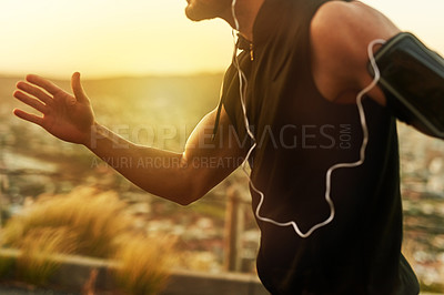 Buy stock photo Shot of an unrecognizable man exercising outdoors