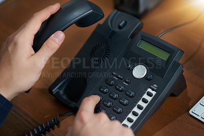 Buy stock photo Hand dial, voip telephone and office for communication, contact us and consulting agent. Telemarketing person, phone call or button on table for customer service, help or tech support on network