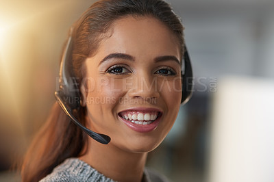 Buy stock photo Shot of a young female agent working in a call center