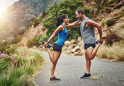 Buy stock photo Couple, stretching and together on mountain for fitness, warmup and commitment to wellness. Man, woman and training in nature for health, wellbeing and fresh air for work out, cardio or endurance