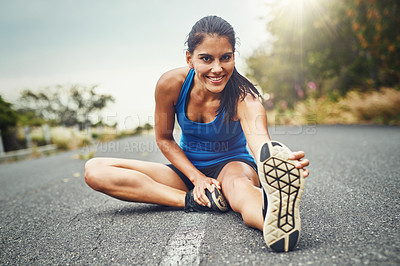 Buy stock photo Portrait, road and woman stretching leg for running challenge, marathon training or cardio in morning. Runner, warm up and athlete getting ready for workout, exercise or sports activity in nature