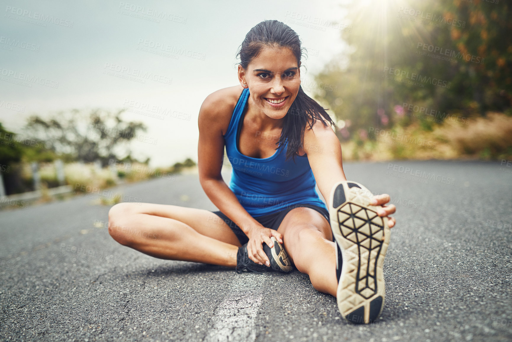 Buy stock photo Portrait, road and woman stretching leg for running challenge, marathon training or cardio in morning. Runner, warm up and athlete getting ready for workout, exercise or sports activity in nature