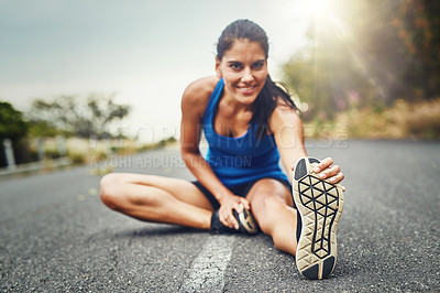 Buy stock photo Road, portrait and woman on floor stretching leg for running challenge, marathon training or cardio in morning. Runner, warm up and athlete getting ready for workout, exercise or sports activity