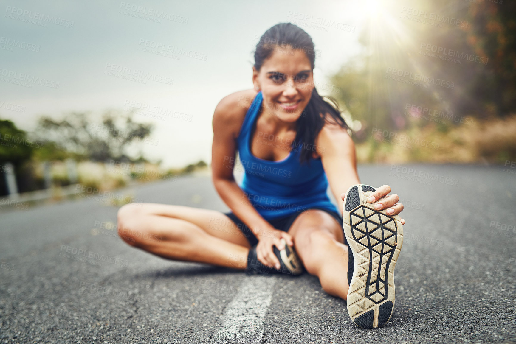 Buy stock photo Road, portrait and woman on floor stretching leg for running challenge, marathon training or cardio in morning. Runner, warm up and athlete getting ready for workout, exercise or sports activity