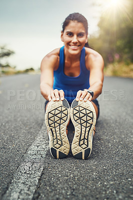 Buy stock photo Stretching legs, portrait and woman in road on floor for running challenge, marathon training or cardio in morning. Runner, warm up and athlete getting ready for workout, fitness or sports activity