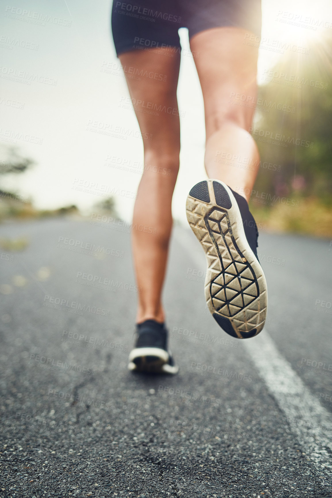 Buy stock photo Legs, person and running in road for fitness, workout and exercise for health in Brazil. Outdoor, dedicated and marathon with routine or activity for wellbeing, wellness and self care with training