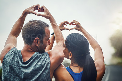 Buy stock photo Back, people and couple with heart sign for fitness, workout and exercise with health. Relationship, outdoor and happy on break with routine or activity for wellbeing, wellness and self care