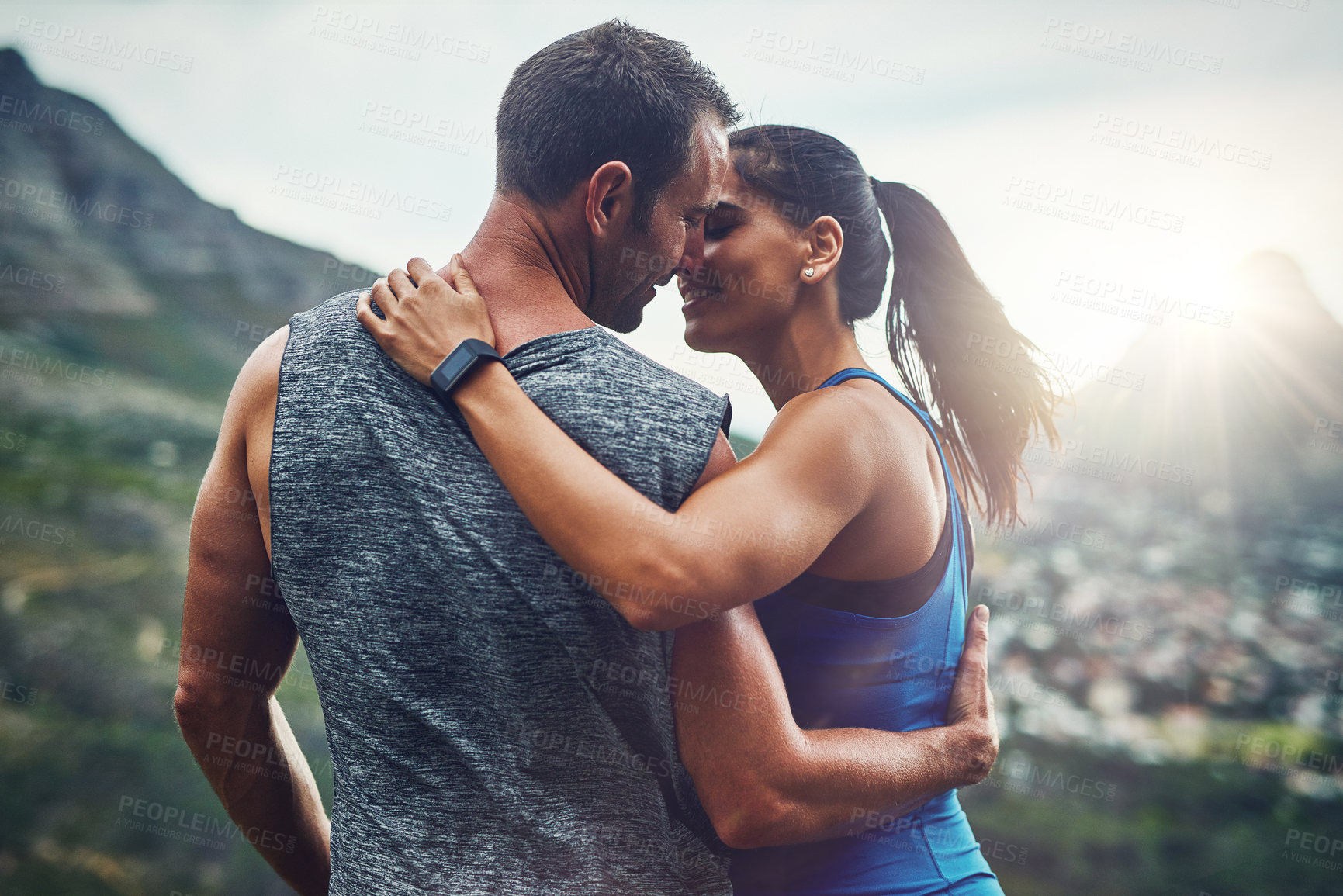 Buy stock photo Fitness, couple and kiss on mountain for workout, outdoor marathon and training as team. Wellness, man and woman together outside in nature with love for health, exercise and adventure or cardio