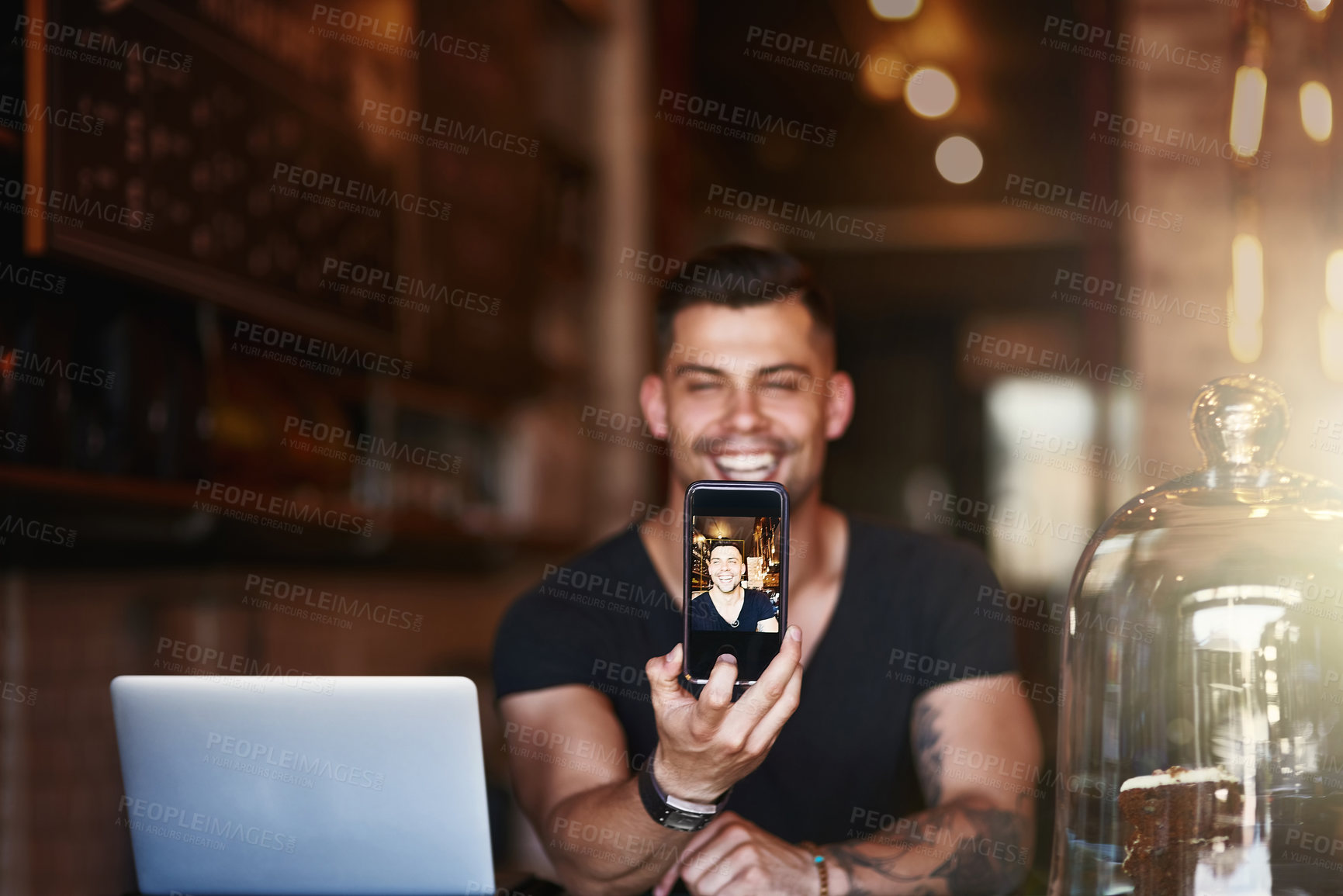 Buy stock photo Phone screen, selfie and man at cafe with laptop for coffee shop promotion, blog or startup memory. Restaurant, business owner and entrepreneur with smartphone app for social media profile picture