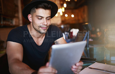 Buy stock photo Online, coffee shop and man in cafe with tablet for small business, stock inventory and store website. Restaurant, hospitality and waiter by counter on digital tech for orders, help and search