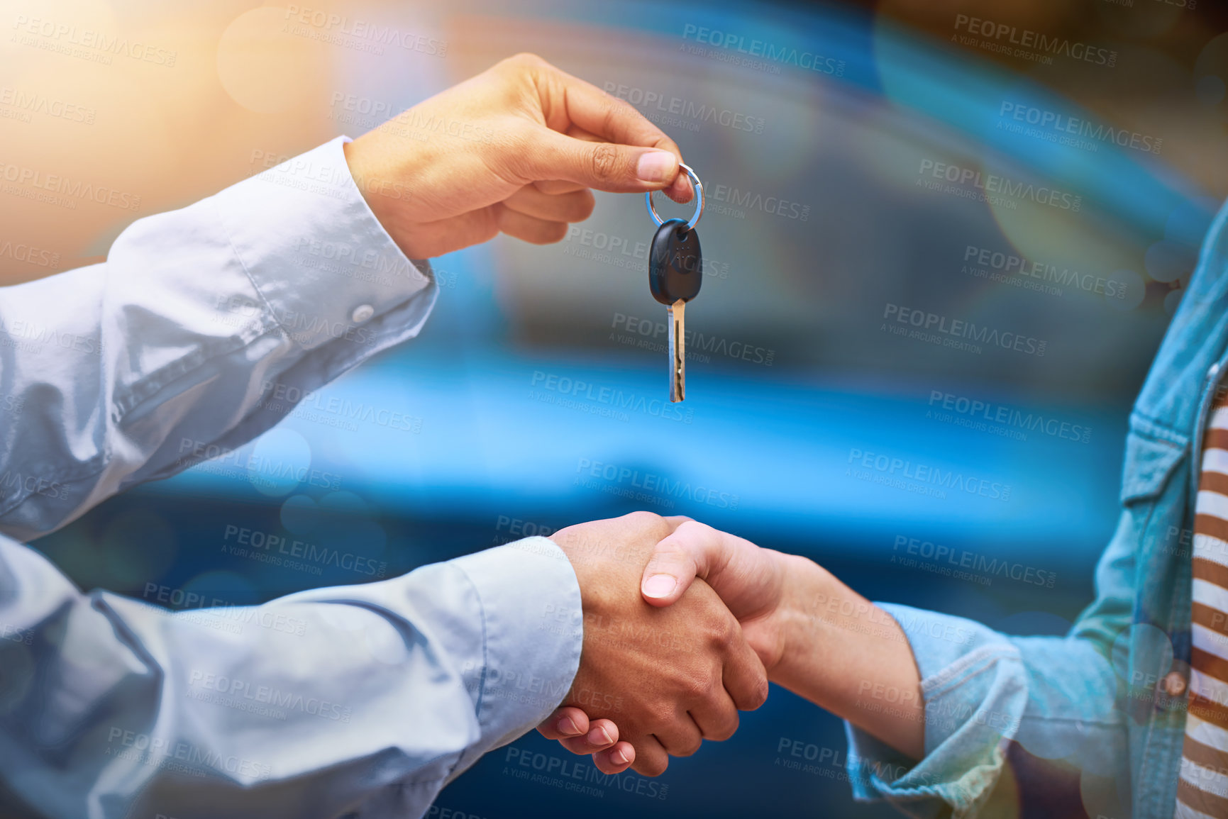 Buy stock photo Cropped shot of a man handing a woman the keys to her new car