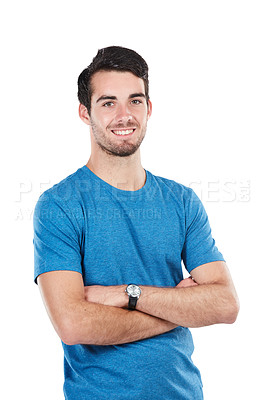 Buy stock photo Cropped portrait of a handsome young man standing with his arms folded against a white background