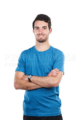 Buy stock photo Cropped portrait of a handsome young man standing with his arms folded against a white background