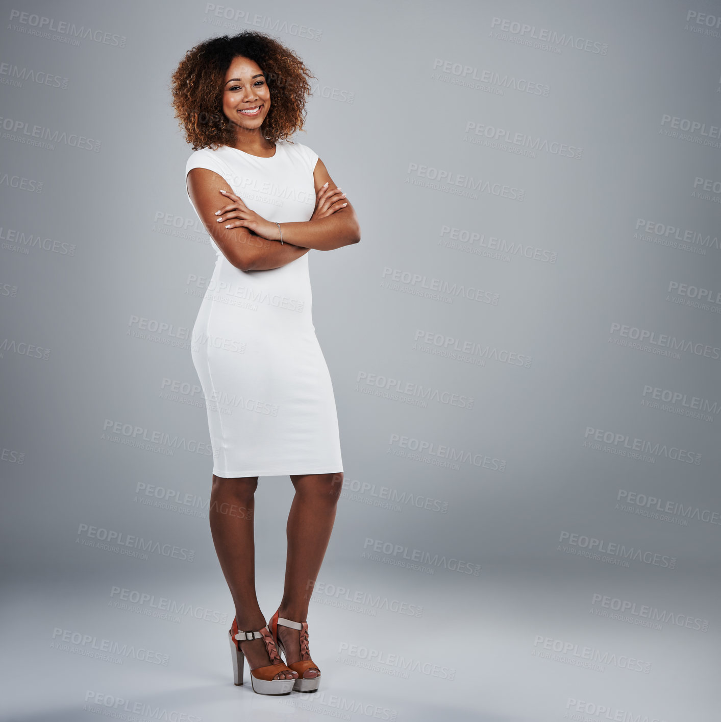 Buy stock photo Studio shot of a young businesswoman against a gray background