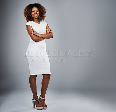 Buy stock photo Studio shot of a young businesswoman against a gray background