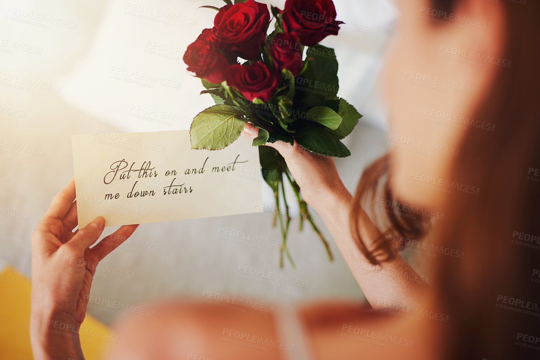 Buy stock photo Woman, roses and note with gift in bedroom on birthday, celebration and valentines day event in home. Girl, reading letter and back with bouquet, flowers and invitation with announcement in house