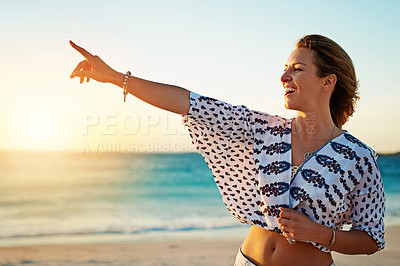 Buy stock photo Shot of a young woman on the beach