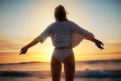 Buy stock photo Shot of an unecognizable woman on the beach