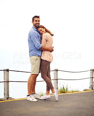 Buy stock photo Couple, hug and smile in portrait, outdoors and vacation or holiday, romance and date together. Happy people, freedom and embrace on street, travel and explore for tourism, love and carefree or joy