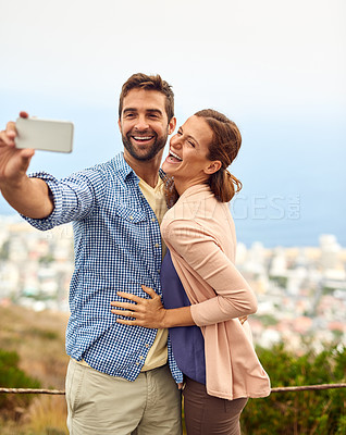 Buy stock photo Couple, hug and selfie on vacation, laughing and outdoors on adventure, love and memories for social media. Happy people, smartphone and bonding or technology, travel and holiday or free on date